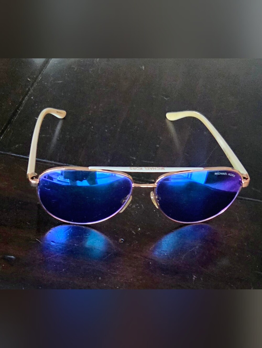 Michael Kors Blue Mirrored Aviator Sunglasses. Store Price: $141.60